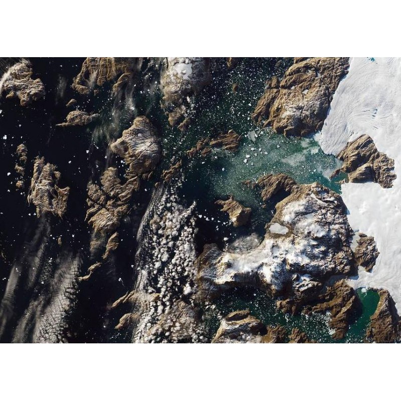 Iceberg Towers Over ...